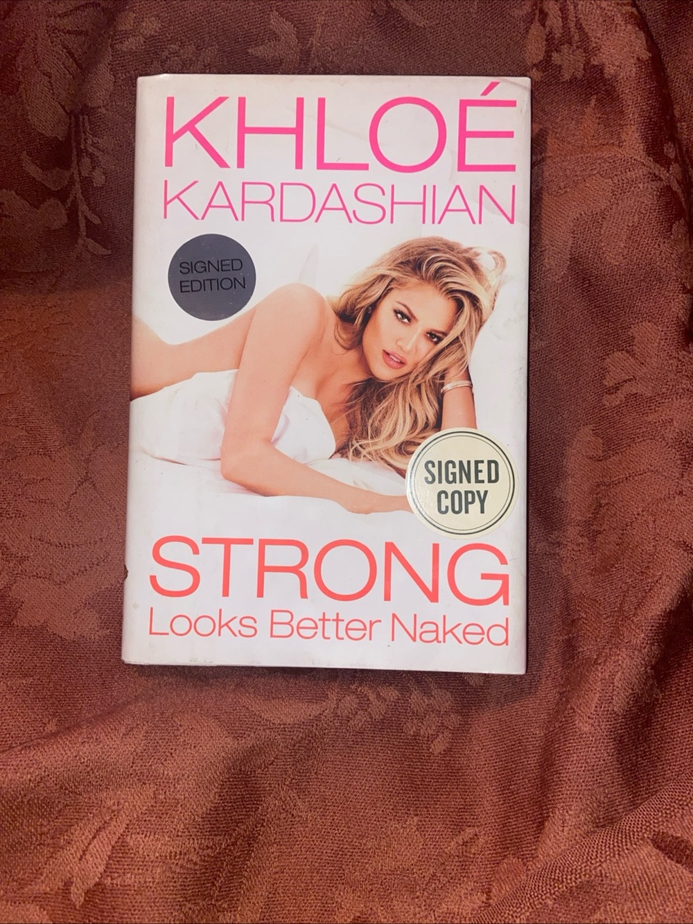 Khloé Strong Looks Better Naked - White & Pink Cover Photo book